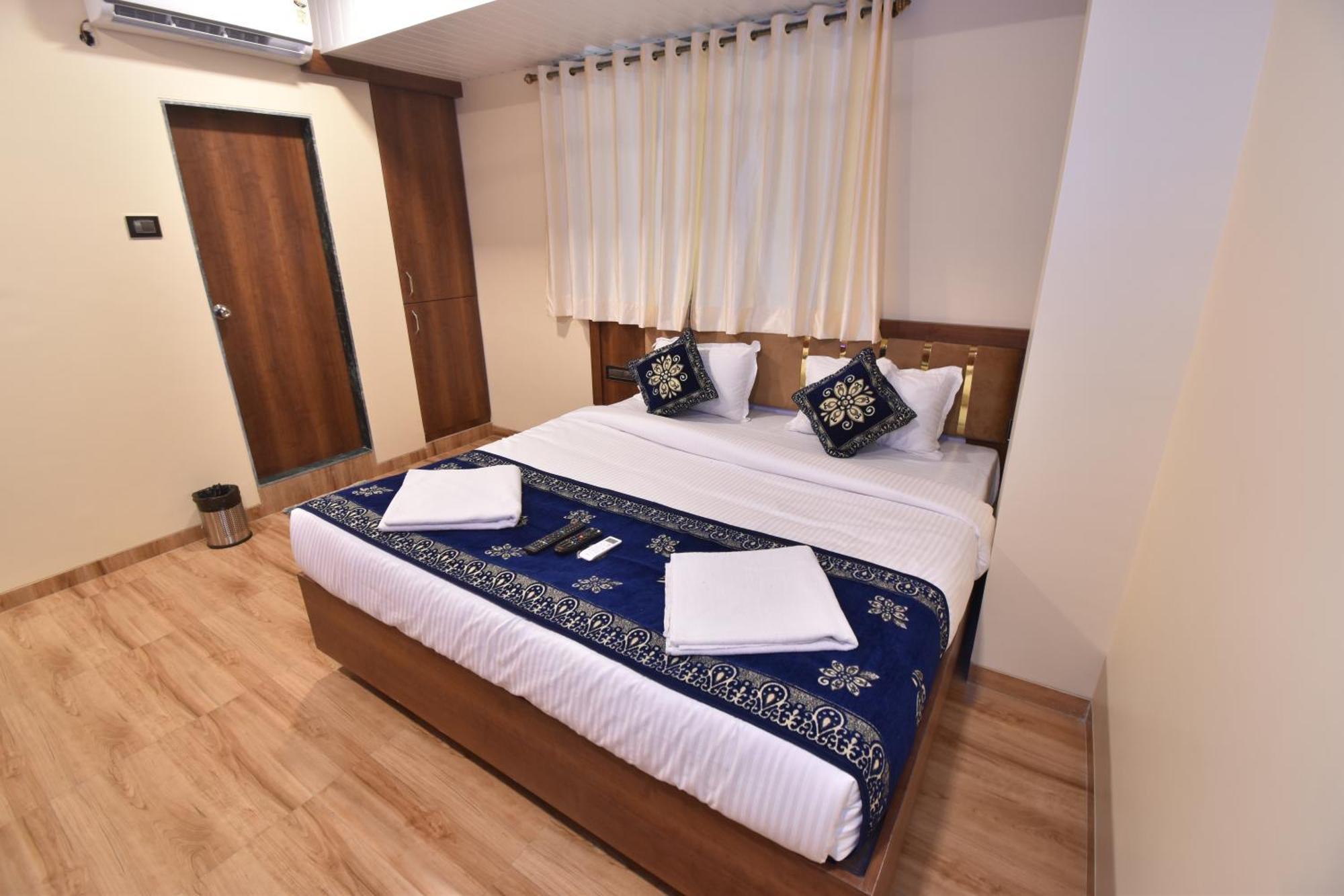 Hotel Starlit Нави Мумбаи Номер фото